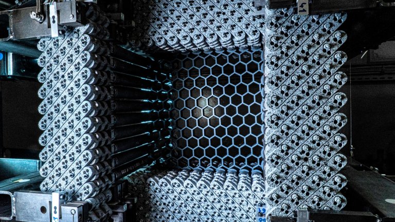 A network of hexagonal cells forming an artificial honeycomb, widely used in aeronautics